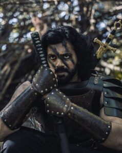Ashwin Kakumanu Instagram - I wanted to shoot a series of photos recreating the spirit of iconic films/genres/roles that made an impression on me. As a movie fan, as a cosplay geek, and a photography enthusiast, this is my tribute to the images I love.

My #CinemaSpirit series. 

I've loved the period/fantasy genre; Gladiator, Robin Hood, Lord of the rings, and Game of thrones. Couldn't resist coming up with some images inspired by them. 

P.S: Finally lucked out in acting in a period film for real this year - Ponniyin Selvan. Here's to manifesting for more.

#ponniyinselvan #Robinhood #gladiator #LoTR #lordoftherings #GoT #gameofthrones #thelastsamurai #aayirathiloruvan #fantasy #manifest #dressforthejobyouwant #cosplay #epic #period #dressup #actor#essence #spirit #photography #camo #armor #midieval #warrior #katana #sword #editorial #ashwinkakumanu

@manavalanandco