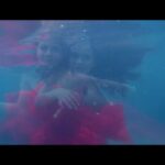 Athulya Chandra Instagram - when the outside world silenced... @cherin_paul ...@sibhichellappa .. . .. .. .. .. #underwater#underwatervideos#tvcshoot#incredibleindia#float#lotus#reddress #redgown #floatingresort #indianmodel #instavideo#mermaidlove#curlswithlove #water #deepbluesea #enigmaconcept #perspective#fashion #themed