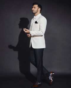 Avinash Tiwary Instagram - Shehar mein mere posters kya lage, Unko meri yaad satane lagi ;) Styled By @shaeroy Hairstylist @anshul_hair Makeup @rohan_mohan09 Photographer @mohitvaru Assistant Stylist @alizaafatmaa Full look @tisastudio Shoes @thealternateindia #KhakeeOnNetflix #Khakeepromotions #KhakeeTheBiharChapter #ChandanMahto