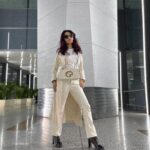 Avneet Kaur Instagram - Monochrome look on point.🤍✈️ #travel #airportlook #avneetstylediaries #styledbyme Wearing- @calvinklein Coat- @urbanic_in Jeans- @lovegen_official Bag- @gucci Boots- @louisvuitton Shades- @prada Accessories- @accessorizeindiaofficial 📸- @singhjaijeet_4 Indira Gandhi International Airport, New Delhi