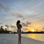 Elena Roxana Maria Fernandes Instagram - Sunset by the sea! . . . @saiilagoonmaldives @crossroadsmaldives @thayyib 👗 @alexandrevauthier 👚 @the_upside 👟 @burberry #saiilagoonmaldives #curiocollection #crossroadsmaldives #visitmaldives #maldivestourism50 #maldives #maldivesisland #paradise #summervibes #summer #leisure #travel #traveldiaries #shoot #visitmaldives #sunset #sea #fashion #style #beachwear #relax #ootd #outfitoftheday SAii Lagoon Maldives, Curio Collection by Hilton