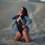 Elena Roxana Maria Fernandes Instagram - Soak up some sun! . . . @fotomanipulationz @gigistudios @goodsagency . . #sun #sand #black #travel #traveldiaries #sunglasses #desert #blackandhot #outfit #outfitoftheday #dress #curves #face #body #bodypositivity #pose #skin #love #beauty #pretty #beautiful #glam #glow #shoot #shootdiaries