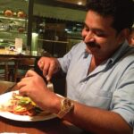 John Abraham Instagram - Sitting with my partner Sheel... Loves his food :)