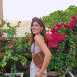 Karishma Sharma Instagram - Spot the flower power 🌺🌺 Loving my outfit from @ramagiq