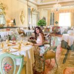 Karishma Sharma Instagram - Suvarna Mahal once was the maharaja's royal banquet hall and the big dining room is still mesmerizing and grand with Italian Renaissance styled Florentine ceiling paintings & mirrors, tapestry-covered walls and gold-plated silverware. Live classical and semi-classical music plays in the background and the four alabaster lamps gleaming in the four corners of the dining hall set the mood in a true royal fashion. What a beautiful experience ❤️ Rambagh Palace