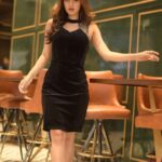 Karishma Sharma Instagram - A little black velvet dress from @dealjeans is all that's going to glam up my New Year Eve! What's your pick for the celebrations? #DealJeans Shot by @jvfilms_