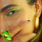 Karishma Sharma Instagram - I had my own way of playing holi this year A lil blur a lil colour. 💚💚🤍💜☮️ Wishing you guys a happy and safe holi 🥳🤗 Shot by @anannyaj_s Makeup by @makeupbykhushikhivishra