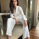 Karishma Tanna Instagram - Proud to wear my dearest friends outfit. She has worked so hard for this dream baby 🥰 Sitting confidently in this white outfit from @houseofsoh Congratulations @sohannasinha . Love u 😘 Jewelry by @aquamarine_jewellery