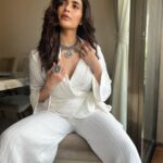 Karishma Tanna Instagram - Proud to wear my dearest friends outfit. She has worked so hard for this dream baby 🥰 Sitting confidently in this white outfit from @houseofsoh Congratulations @sohannasinha . Love u 😘 Jewelry by @aquamarine_jewellery