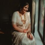 Manjima Mohan Instagram - This was taken just a few minutes before the wedding. While my brain was asking me to be anxious my heart asked me to smile. And I followed my heart ❤️ Green Meadows Resort
