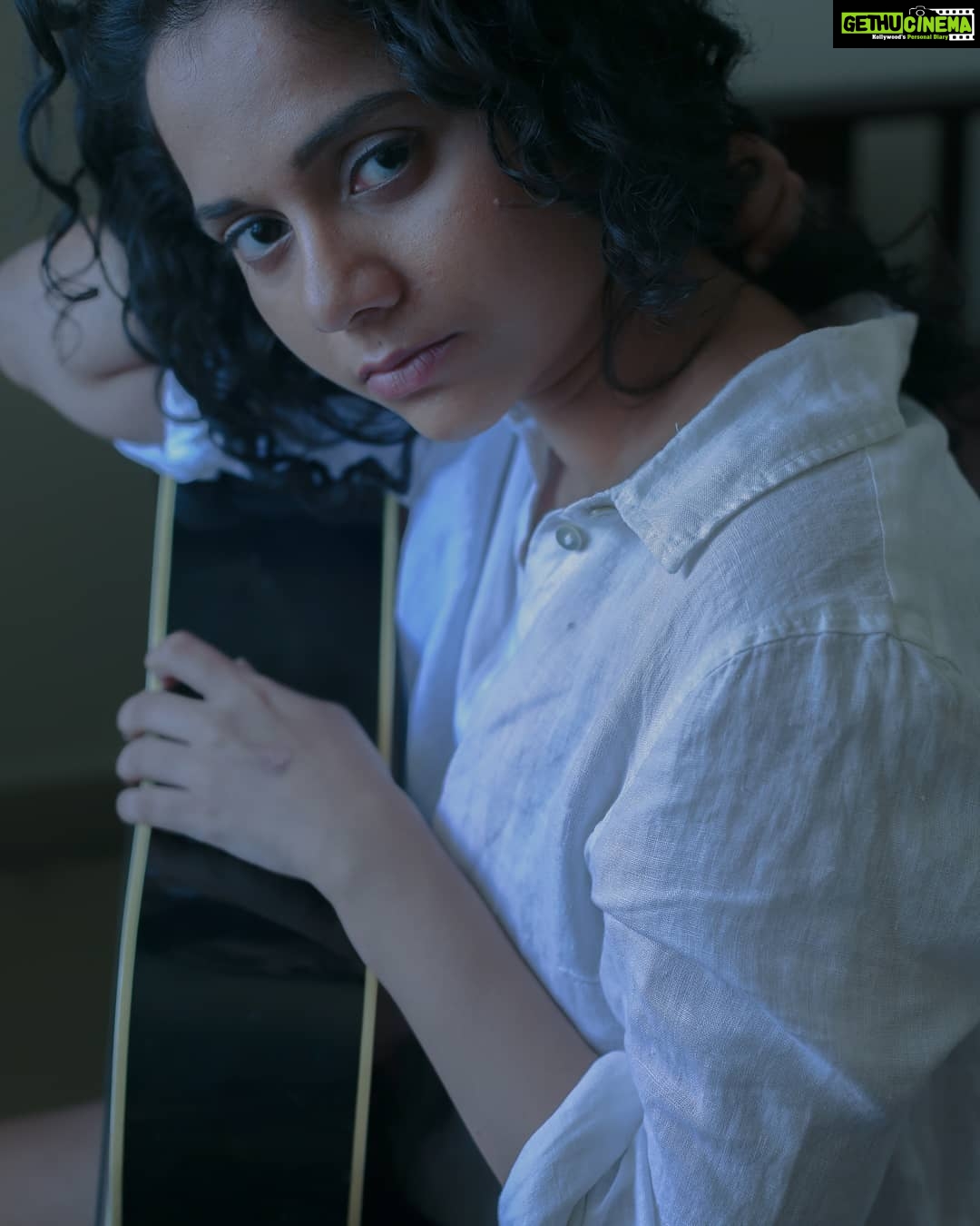Namita Krishnamurthy Instagram - "The looks of my eyes cover you like ivy, You are a city by the sea assaulted, You are a rampart by the light divided Into two halves, distinct, colour of peaches, And you are saltiness, you are rocks and birds Beneath the edict of concentrated noon." - Octavio Paz, from "Sunstone" pub. 1957 Photo credit to the incredible, all-seeing eye of @kanmaniphotography. π #portrait #moodygrams #curlygirl #quarantineshoot #poetry Chennai, India