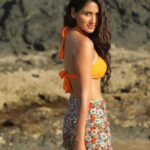 Nikita Dutta Instagram - Forever chasing the golden sun. ☀️ 🍊 . . #ThrowbackThursday #SunKissed #BTS