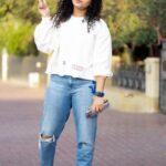 Noorin Shereef Instagram – White is not a trendy color. It’s the color of centuries of fashion!
Casually chilling in White and smiling bright in the simple and stylish outfit with personalized name tag on it by @levis_in 

📸 @vipin_nairs 

#levis #levisindia #customlevis #white Dubai, United Arab Emirates