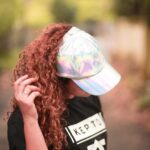 Noorin Shereef Instagram - The offsize shirts, messy hair and that comfy caps to hide the flaws in me😬 Wearing oversized teez from @kepto_fashion Specially designed caps for the curlqueens by @curlcap Pc @amal_s_p_ #curlcap collboration# #flawsontheway🤷🏼‍♀️