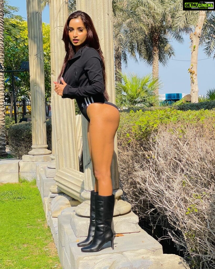 Pooja Bhalekar Instagram - Waiting for the BUS be like…🚌😋 . . . . . . . Bodysuit by @adidasoriginals @adidasindia Jacket by @zara Boots by @aldo_shoes Location @palazzoversacedubai . . . . . . #bodysuit #photooftheday #love #instagood #pictures #look #fashion #stylegram #legs #glam #swimsuit #actress #adidasoriginals #adidas #inspo #igers