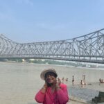 Poornima Bhagyaraj Instagram – At the banks of the Ganga with the #Howrah bridge as the background