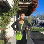 Ruhi Singh Instagram – This look deserves so much more love ❤️ I can’t get over the electric green @thesageaubrey bag. It’s such a statement! Malibu, California