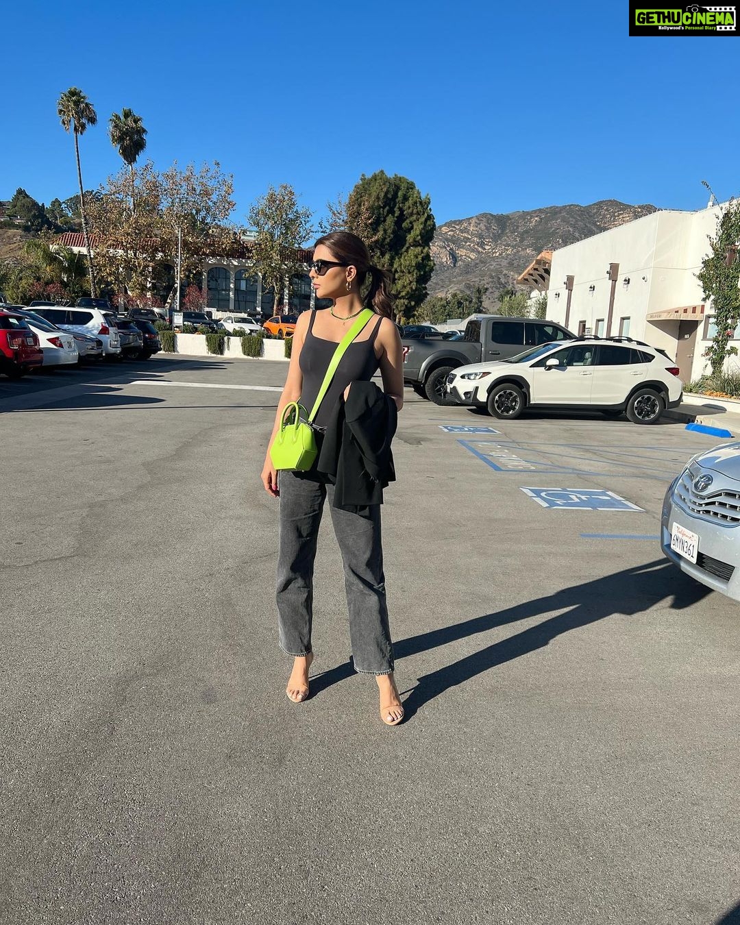 Ruhi Singh Instagram - This look deserves so much more love ❤️ I can’t get over the electric green @thesageaubrey bag. It’s such a statement! Malibu, California