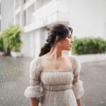 Samyuktha Menon Instagram - Meet me in the pouring rain 🤍🤍 📸 @merin__georg Styling @sandhya__sabbavarapu Wearing @bunastudio @adorebypriyanka H&M @rizwan_themakeupboy #rainy #dress #white #picoftheday #musing #photography #rainyday