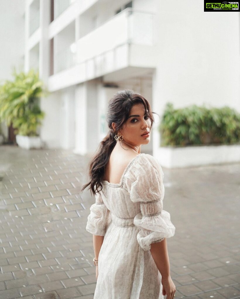 Samyuktha Menon Instagram - Meet me in the pouring rain 🤍🤍 📸 @merin__georg Styling @sandhya__sabbavarapu Wearing @bunastudio @adorebypriyanka H&M @rizwan_themakeupboy #rainy #dress #white #picoftheday #musing #photography #rainyday