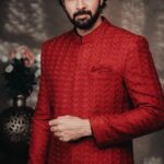 Santhosh Prathap Instagram - Deep red Sherwani with Asymmetrical Kurta. Can be customised to colour of your choice. Models: @santhoshprathapoffl @vekkey @kamurudin Photo: @thevenkatbala Creative & stylist: @jenson16 Makeup: @touchofandy Menswear: #Singarajah Production executive: @durai_making_moves_ Gaffer: @gopal_gaffer . . . . . . . . #Singarajah #SingarajahMenswear #WearingSingarajah #TheMadrasGang #indianwedding #Groomwear #Menwithclass #Cocktailedit2022 #Santhosh #Sarpatta #SarpattaParambarai #Groomsofsingarajah #Bespoke #Madetomeasure #Sherwani #Kurtaformen #Tamilwedding #SingarajahShoes #Formalshoes #Veshti #Cocktailwear #Groomsinspiration