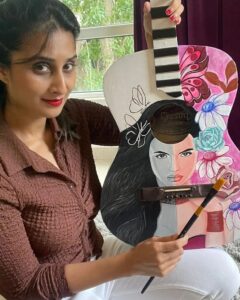 Shamlee Instagram - Work in progress by the beautiful @shamlee_official lending her magic to this 30+ year old guitar for the #wastetovalue #auctiontotakeaction featuring @karthi_offl 🤩 Super delighted to have her on board & we thank you profusely for your support since day one 💚💥