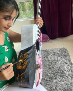 Shamlee Instagram - Work in progress by the beautiful @shamlee_official lending her magic to this 30+ year old guitar for the #wastetovalue #auctiontotakeaction featuring @karthi_offl 🤩 Super delighted to have her on board & we thank you profusely for your support since day one 💚💥