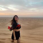 Sherlin Seth Instagram - Surreal sunsets 🧡🤌🏻 . . . . . . #sherlinseth #explorepage #explore #foryou #forme #viralpost #viral #desert #desertsafaridubai #goldenhour #skirt #croptop #tamilactress #bollywood Al Badayer Desert