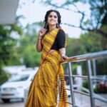 Surabhi Lakshmi Instagram - Yellow is capable of charming God. Costum by: @julaha_archana_arun Makeup by: @abilashchicku Photography: @shemir_m @artechweddingteam