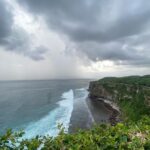 Surabhi Santosh Instagram - Uluwatu Temple was the last stop in my two week trip. It is definitely a must go! A walk through the scenic cliff during sunset just fills your soul. The cliff and sea beneath gives you a Varkala feel but the naughty and thieving monkeys will quickly make you realize that you are not in Kerala. And I’m not joking when I say that those monkeys will steal everything, from the specs resting on your head to your footwear if you leave it around, wallet and even your phone so saving your stuff from them takes a lot of effort and is an adventure in itself 😂 SWIPE LEFT #Balistories #uluwatutemple #traveltips #scenicbeauty #adventure #laughs Uluwatu Temple, Uluwatu, Bali