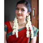 Surabhi Santosh Instagram - #ChubbyCheeks 😁 Throwback to a very old photo! So do I look better with the chubby cheeks or without? Comment! . . . . #simplysouth #southindian #halfsaree #langadavani #red #brightcolours #Jasmineflowers #pottu #OutfitofTheDay #InstaGlam #Bangalore #BangaloreBlogger #MalayaliKutty #Malayali #Kerala #Kochi #Mallugram #EnteKeralam #happyVaishu