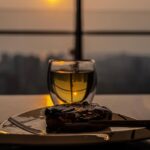 Vivek Dahiya Instagram - Just what comes to the rescue when I’m feeling a tad under the weather. A donut. A lemon detox green tea. Setting sun (upon request). Soft piano in the background. #October #VivekDahiyaPhotography #VDphotography Mumbai, Maharashtra