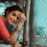 Rethika Srinivas Instagram – Where words are restrained, the eyes often talk a great deal.

#recentphotoshoot ✨

Photo @nvn_photography446 
Edit @rasvik_m 
Styled by @styleupramyasekar @ramya_sekar_design_studio @velvetstories_ 
Hair and Make up @nirmala.jansi 
Location @casuarina_bay 

———
#eyes #newphotoshoot #trending #closeup #wood #rethikasrinivas #rethikasjustmyway #instafamily #expression #positivevibes #chennai #moodygrams #justanotherdayinwa #skincare #messybun #attitude #positivity #blue #exclusive #timeless #instagood #instafamous #red #actress #staysafe #staypositive #bangles #indigo #eyes Casuarina Bay