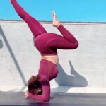 Aashka Goradia Instagram - #PinchaMayurasana Upper back muscles and shoulder strengthening. Core - Balance - Enticing Focus - Breath . . . . #inversions #pincha #yoga #workout #shoulderstability #forearmstand