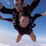 Adaa Khan Instagram – All it takes is One Step, and you can FLY. 🪂 
Have you taken that step yet?
.
.
.
#throwback #goodpart #trending #reels #reelitfeelit #skydiving #bucketlist  #yolo #instagood #travelholic #adaaventure #grateful #adaakhan #adventure #solo ♥️