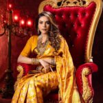 Anjum Fakih Instagram - NAVRATRI:- DAY 4 featuring @nzoomfakih as the Modern Indian Goddess where she represents the color YELLOW 💛 . Shoot Concept & Designed By:- @nehaadhvikmahajan @bridalsbynam . 💄MUA , Hair & Styling :- @nehaadhvikmahajan . 📸:- @luvisrrani . 🥻Saree :- @kankatala_ . 💍Jewelery :- @pooja_diamond . Makeup :- @maybelline . Managed By :- @allboutcommunication . #anjoomfakih #srishti #kundalibhagya #makeup #ootd #nehaadhvikmahajan #makeupbyme💄 #nammakeovers #bride #to #be #bridal #look #bridalmakeupartist #destinationweddingmakeupartist #weddingmakeup #hair #hairstyling #nammakeovers #bollywood #television #makeupartist #mumbai #traveller #all #over #the #globe