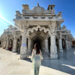 Devoleena Bhattacharjee Instagram - Bhuj is one of the six places where Lord Shree Swaminarayan constructed the temple Himself. Expanding a 35,000 sq. feet area, this Temple has 7 sky touching pinnacles. It consists of one central dome, 25 minor domes and 258 pillars. The peripheries, which are beautifully carved into the icy marble of Makrana and Ambaji, give it heavenly beauty, serenity and the divine approach to the temple. @rannutsav #RannKeRang, #RannUtsav2022, #RannKiKahaaniya #swaminarayantemple #devoleena Shree Swaminarayan Temple - Bhuj Prasadi Mandir