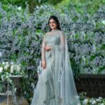 Divya Pillai Instagram - 𝑱𝑴 𝑺𝒊𝒈𝒏𝒂𝒕𝒖𝒓𝒆 𝑮𝒐𝒅𝒆𝒕 𝑺𝒂𝒓𝒆𝒆!!... The tulle cast in pastel shade speaks volumes of the inner grace intricated handwork that it beholds the charm & serenity The bejewelled neck gives gorgeous look to the bride without jewellery The godets and frills given in the pleating area of ​​the saree gives a classy look!! . . . . New collections available in Kochi store.... InFrame : @pillaidivya Bridal Outfit:@jeunemaree MUA:@makeupartist_jyotibutola Photography:@rejibhaskar_ Video:@celestiamedia Editing:@ajitjess Decor:@st_martin_wedding_planners Bouquet:@azalea_wedding_gallery Venue:@town_not_far_away Concept &Styling:JeuneMaree Team . . . . WhatsApp us on +91 85928 14248 Know more @jeunemaree #divyapillai #jeunemaree #jeunemareebridaledit2022 #Midyear #saree #sareelovers #sareeblouse #designersarees #sareecollection #wedding #weddingsaree #bridalsaree #bridalcollection #weddingdresses #weddingsareedesign #bridaldressmaker #weddingboutique #designersarees #bride #bridesofkerala #bridesofindia #boutiqueonline #boutique #keralaweddingphotography #keralawedding #boutiqueshopping #weddingphotos #bridal @divyapillaifans @divyapillai__fans @fans_of_dp