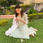 Eisha Singh Instagram - Secret conversations between the trees and sky, hums a tune of peace in my heart.🌻 . . . Adding green to my garden in this beautiful outfit by @roze.india ♥️ Juttis: @saya.india