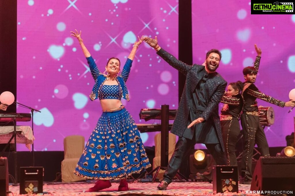 Esha Kansara Instagram - Issa vibe! Our sangeet was filled with nothing but love, life and laughter! 💙💙💙#sidkiesha Special mention for @bhumikshahlive & @ojasrawal who created this vibe and hosted the best sangeet ever!!! THANK YOU guys! ❤️❤️❤️🥳🥳🥳 Oh, and yes, I wore pink sneakers for my sangeet 😋🥳 #comfort>style Photography @karmaproduction_india Choreography by @beatpethumka @neelimasharma99 Sangeet by @bhumikshahlive Hosted by @ojasrawal Tech Powered by @ledsolutions_ahmedabad @vivekghodadesigns Outfit @papadontpreachbyshubhika Hair @_hair.by.freya_ Make up @theglitterboxbyshreyapatel Event managed by @anc_events