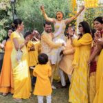 Esha Kansara Instagram - Never knew our families loved dancing THIS MUCH! 😍🥰🥳💛 🥳🤭💛 @musicwaala Photography @karmaproduction_india 🌸 Outfit @picchika Jewellery @vaidaan.official HMU? No make up at all by me myself 🤪