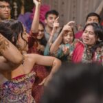 Esha Kansara Instagram - Never knew our families danced THIS MUCH! 😃🥳💃🥰🤩❤️ Our mehendi had nothing but a chill, fun and dancing on dhol kind of a vibe🥁 Special thanks to @annu_patel1402 @annus_creation for making this outfit specially for me in a few days time and my very dearest @aesha.desaii @tamraa.bespokejewelry for styling this jewellery and creating a perfect look! And @jayshreebridalmehandi for this minimal yet beautiful mehendi! Thank you girls ❤️🥳 Photography by @karmaproduction_india 🤍🤍🤍 Hair by @_hair.by.freya_ Make up by @theglitterboxbyshreyapatel #mehendi #mehendidesigns #bridesofindia #gujaratibride