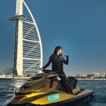 Garima Chaurasia Instagram - Life is just more fun when you're on a jet ski..🤩🌊💛 Loving my 24k gold jetskiii @luxuryjetskidubai @mohammadrihab_ #gimaashi #jetski #luxuryjetskirentals #watersports #dubai #visitdubai #adventure #ride #burjalarab #gimaians Burj Al Arab, Dubai
