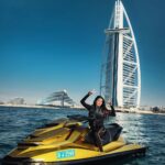Garima Chaurasia Instagram - Life is just more fun when you're on a jet ski..🤩🌊💛 Loving my 24k gold jetskiii @luxuryjetskidubai @mohammadrihab_ #gimaashi #jetski #luxuryjetskirentals #watersports #dubai #visitdubai #adventure #ride #burjalarab #gimaians Burj Al Arab, Dubai