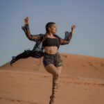Garima Chaurasia Instagram - Wanderlust and desert dust.. 🌪️ . . . 📸: @nitin_.1610 Edit: @welcomeishu3694 #gimaashi #desert #Dubai #photoshoot #sanddunes #safari #desertsafari #gimaians #blackislove Desert Safari Dubai