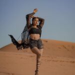 Garima Chaurasia Instagram - Wanderlust and desert dust.. 🌪️ . . . 📸: @nitin_.1610 Edit: @welcomeishu3694 #gimaashi #desert #Dubai #photoshoot #sanddunes #safari #desertsafari #gimaians #blackislove Desert Safari Dubai