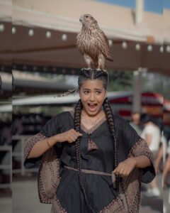 Garima Chaurasia Instagram - My 4th pic story: I was saying Habibiii come to Dubai!! 🤪 & suddenly he jumped on my head! 😵‍💫🙆🏻‍♀️ And I was like gyi Meri Braids🥲😆 . Well, He is Mr. Shahheeennn 🦉 6th months old Baby. . 📸: @nitin_.1610 Edit: @welcomeishu3694 #gimaashi #safari #sanddunes #dessert #Dubai #dubaisafari #visitdubai #explore #gimaians Dessert Safari Dubai