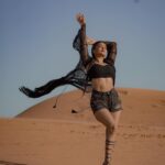 Garima Chaurasia Instagram - Wanderlust and desert dust.. 🌪️ . . . 📸: @nitin_.1610 Edit: @welcomeishu3694 #gimaashi #desert #Dubai #photoshoot #sanddunes #safari #desertsafari #gimaians #blackislove Desert Safari Dubai