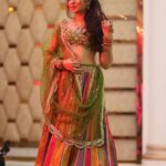 Geet Gambhir Instagram - Rang Rasiya ♥ P.S finally received some good pictures from brother’s wedding 🥰😅 . . . . . . . . #lehanga #indianlook #wedding #punjabi #indianwedding #jwellery #bangles #colorful #fashion#style #geetgambhir #shivoham #hairdo #dupatta