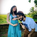 Jankee Parekh Instagram - Through our month long stay in Goa last year (Sept. 2020) I remember only taking photographs chest up as I was 5 months pregnant and we had still not announced it. I remember getting so annoyed with Nakuul because I would never be able to share any of the pictures I had taken simply because of my bump showing. Then one day, whilst we were day-tripping in Dewar island, I told Nakuul, 'Enough is enough, it’s time we just put it out that we are expecting'. And to my surprise, he was like 'Cool, let’s do it.' He stopped the car in the middle of nowhere, got the tripod out of the car, took me right in the middle of these gorgeous fields, put the camera on timer and asked me to pose... And I was like 'Wait, what am I suppose to do?' He asked me to just hold my belly. And just like that we got the photo to announce our pregnancy. It’s only when we got back to our villa, I realised that my chipped nail paint looked horrible in the photograph and I canned the idea of announcing my pregnancy that day. All of next day Nakuul and I went looking for a nail paint remover from one pharmacy to the other, until we finally found one. So that's the story behind why we didn't go with the "Holding Belly in the Green Fields with the messed up Nails" photo... Sounds a little lame right now, but my pregnancy hormones dint make me feel that way... Now that I have a child, it’s made me realise that chipped nail paint is the most non existential crisis one can even imagine amidst a plethora of real ones... Did any of you ever go through such frivolous drama while being preggers and your partner played along? #motherhood #firsttimemom #pregnancydays #goadiaries #babymoon